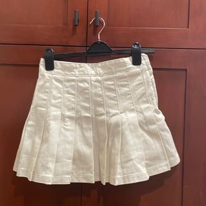 Cream color pleated skirt with built in shorts